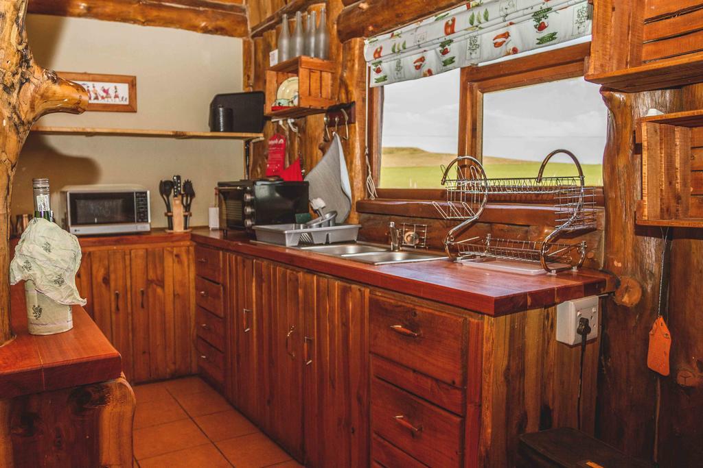 A Log Home At Buffalo Creek Buffeljagsrivier Exteriör bild